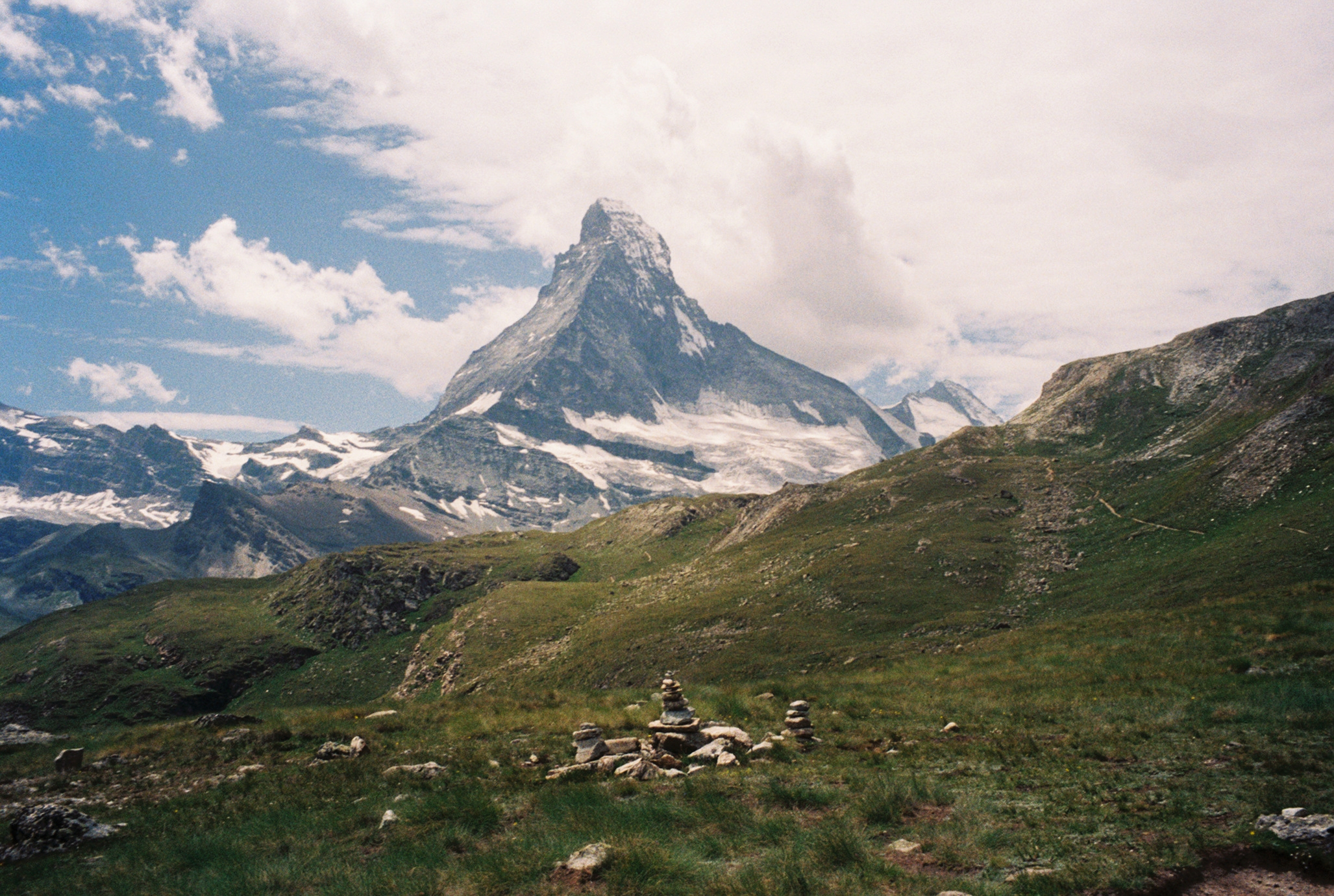 Matterhorn mountain with hiking trail cairns