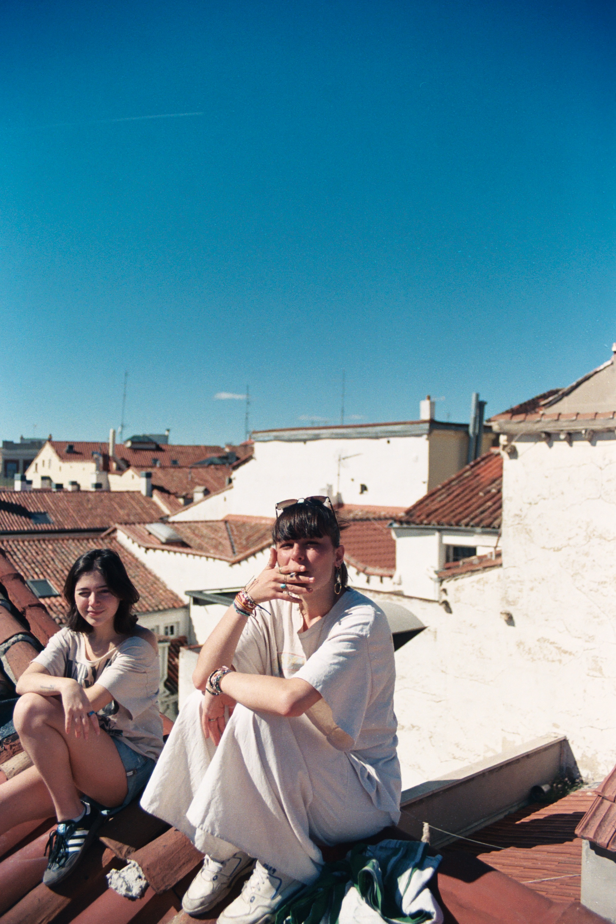 People sitting on rooftops
