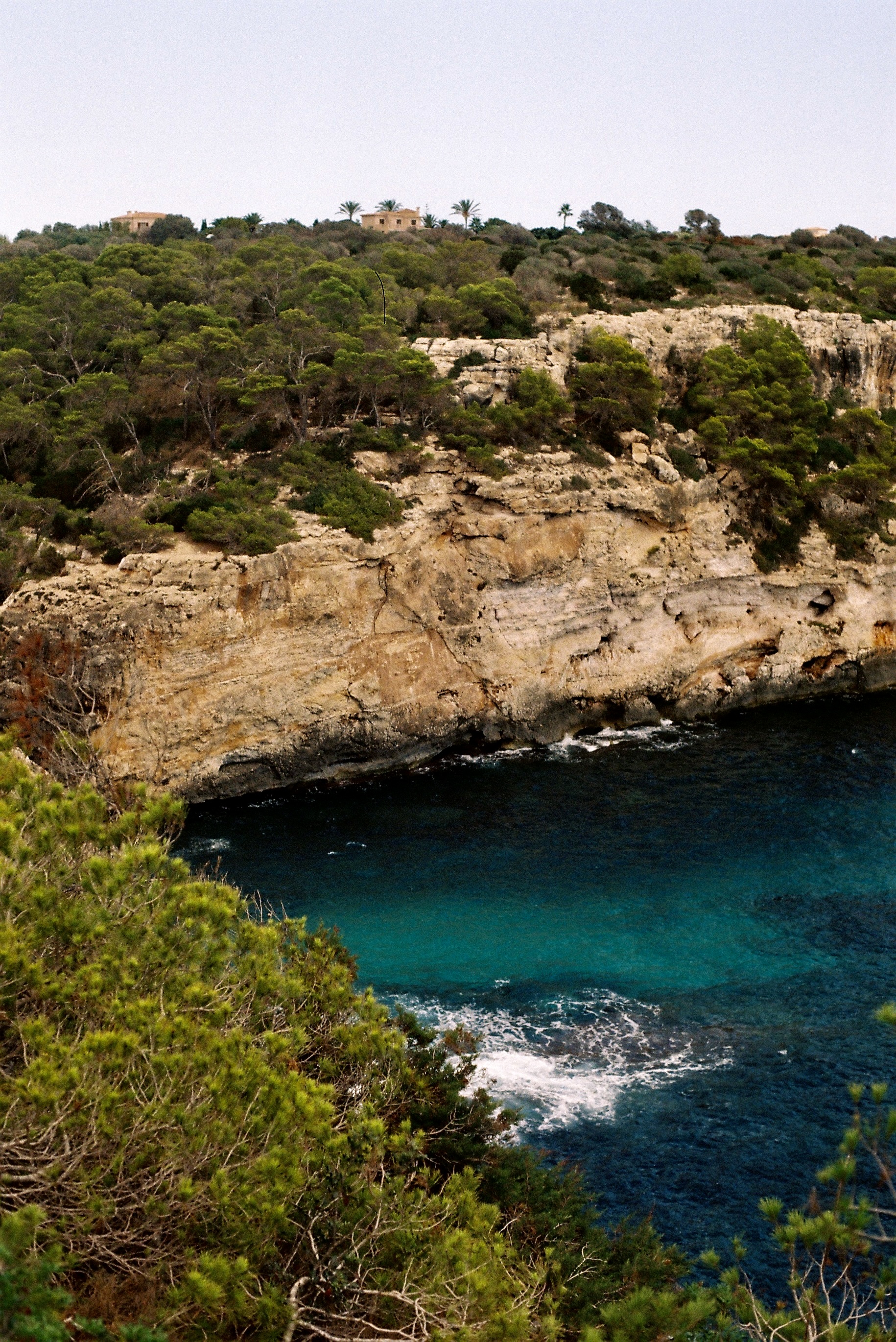 Spanish Mediterranean coastline with limestone cliffs and turquoise waters